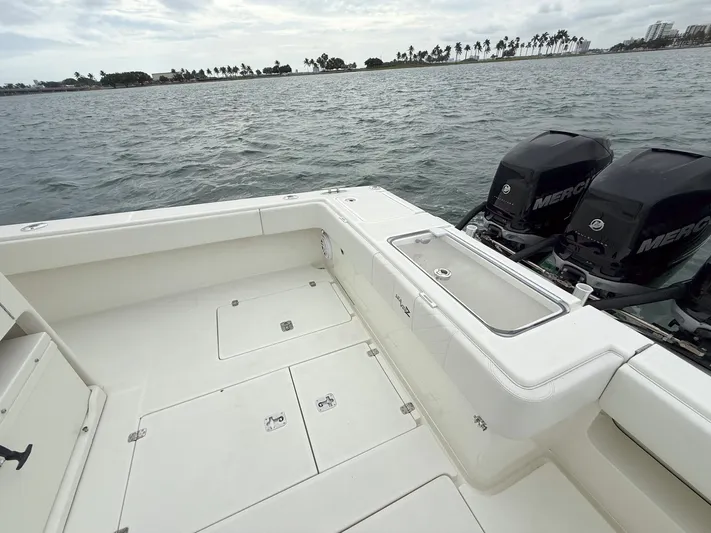  Yacht Photos Pics 2015 SeaVee 340Z boat with dual Mercury engines on open water.