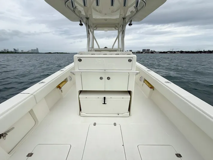 Yacht Photos Pics 2015 SeaVee 340Z boat interior, open deck view on water.