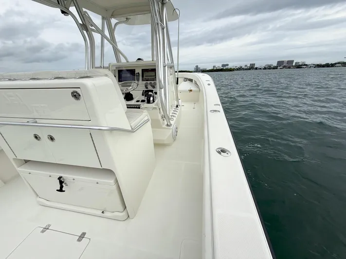  Yacht Photos Pics 2015 SeaVee 340Z boat on water, featuring spacious deck and modern controls.