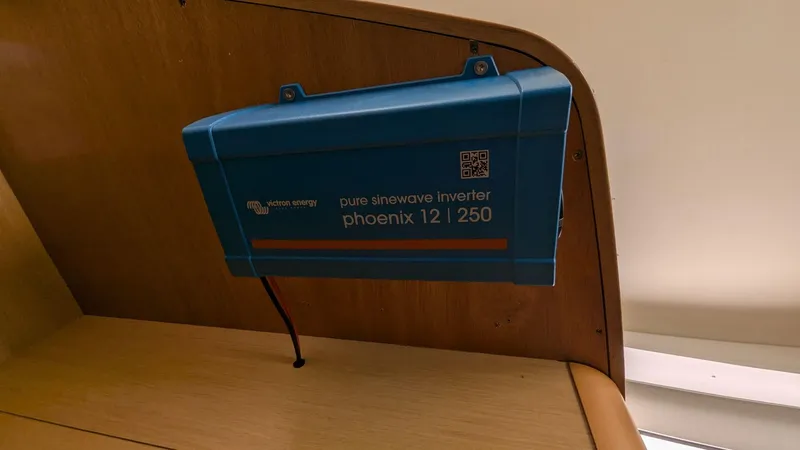 Mango IV Yacht Photos Pics Blue Victron Energy inverter in a 2017 Lagoon 42 yacht interior.