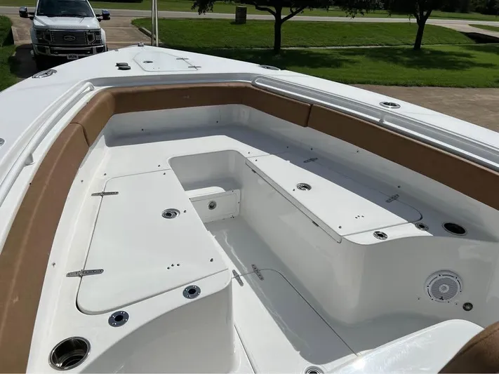  Yacht Photos Pics 2022 Sea Hunt Gamefish 27 boat interior with spacious seating and storage compartments.