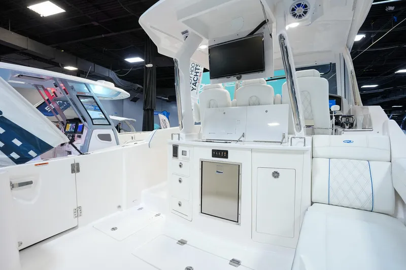  Yacht Photos Pics 2025 Regal 33 SAV boat interior with modern amenities and sleek design.