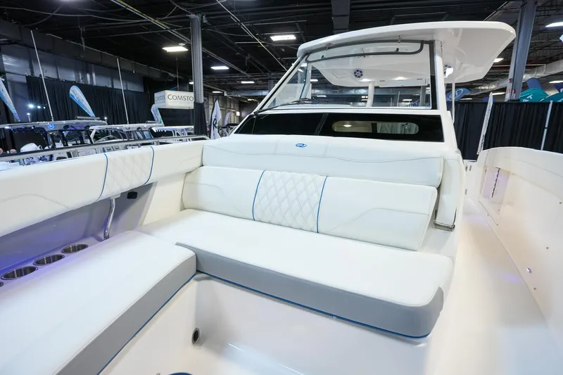  Yacht Photos Pics 2025 Regal 33 SAV boat interior with luxurious white seating and modern design.