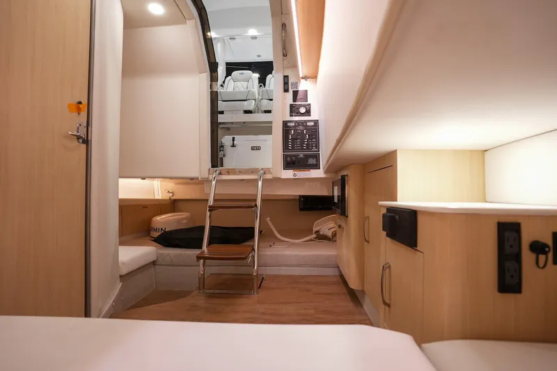  Yacht Photos Pics Interior of 2025 Regal 33 SAV boat, featuring modern design and compact living space.