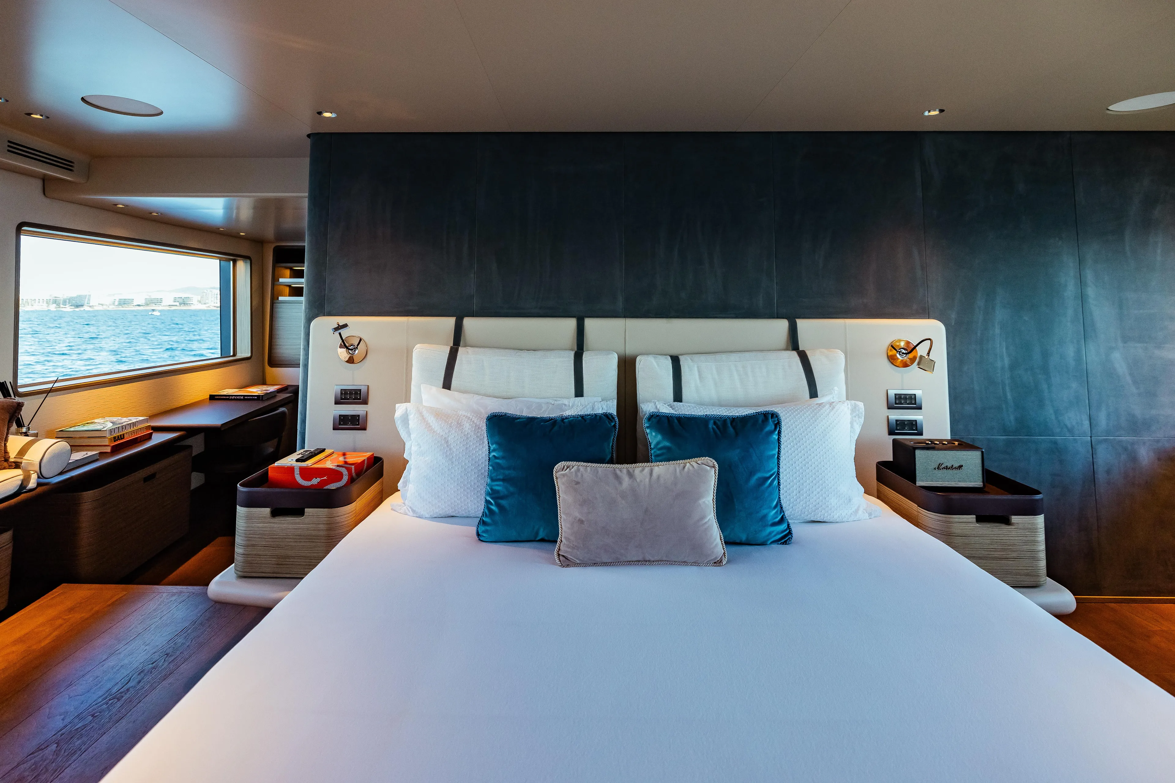  Yacht Photos Pics Luxurious bedroom interior on 2022 Custom Line Navetta 30 yacht with ocean view.