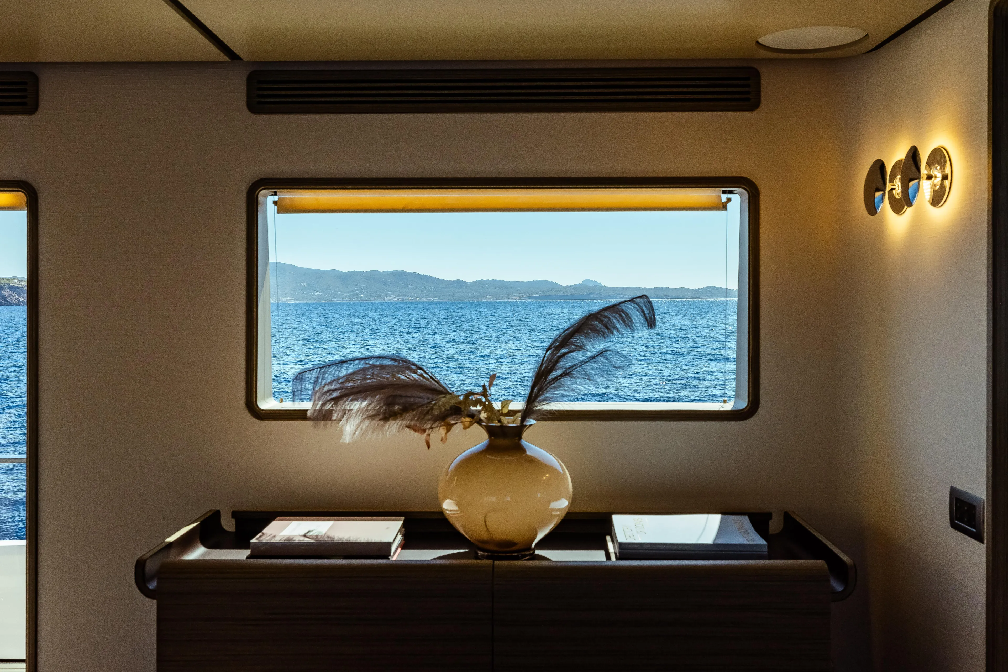  Yacht Photos Pics Luxurious interior of 2022 Custom Line Navetta 30 yacht with ocean view.