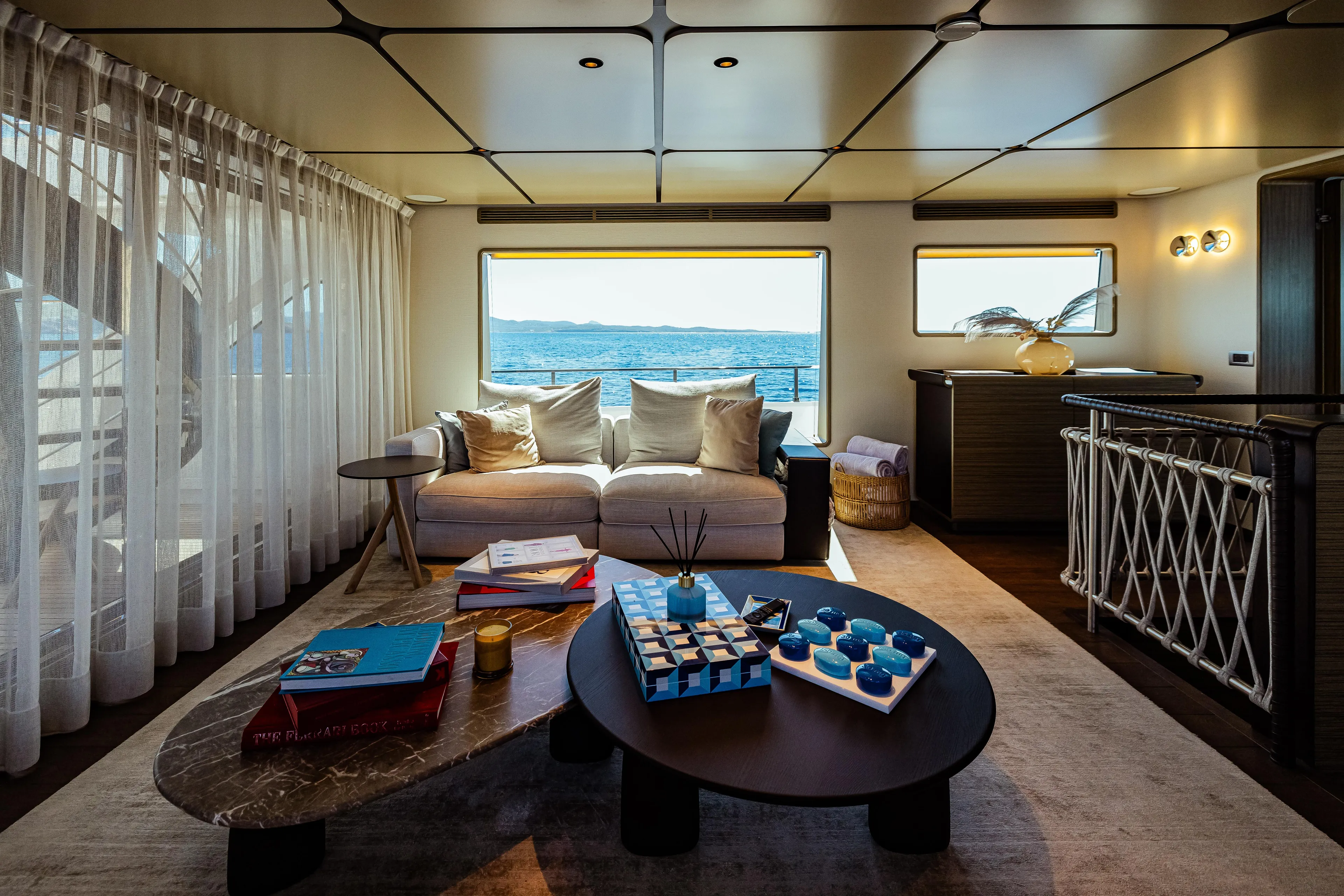 Luxurious interior of 2022 Custom Line Navetta 30 yacht with ocean view.