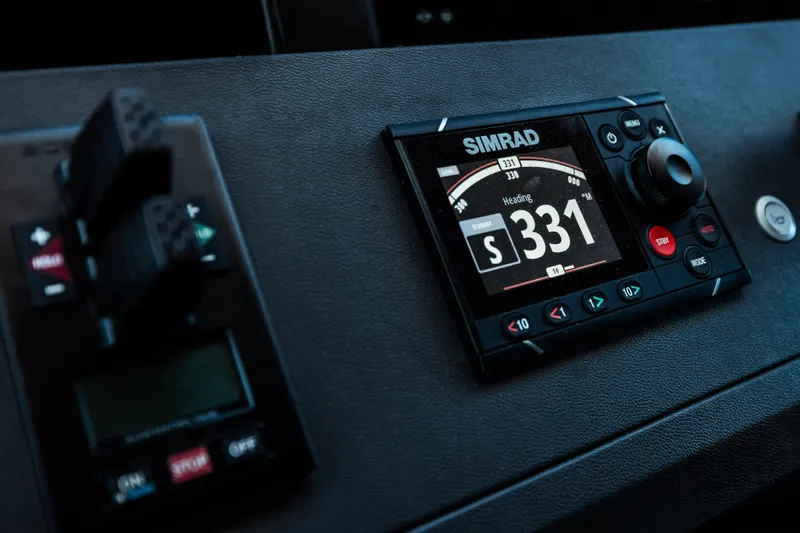  Yacht Photos Pics Simrad navigation system on 2022 Custom Line Navetta 30 yacht dashboard.