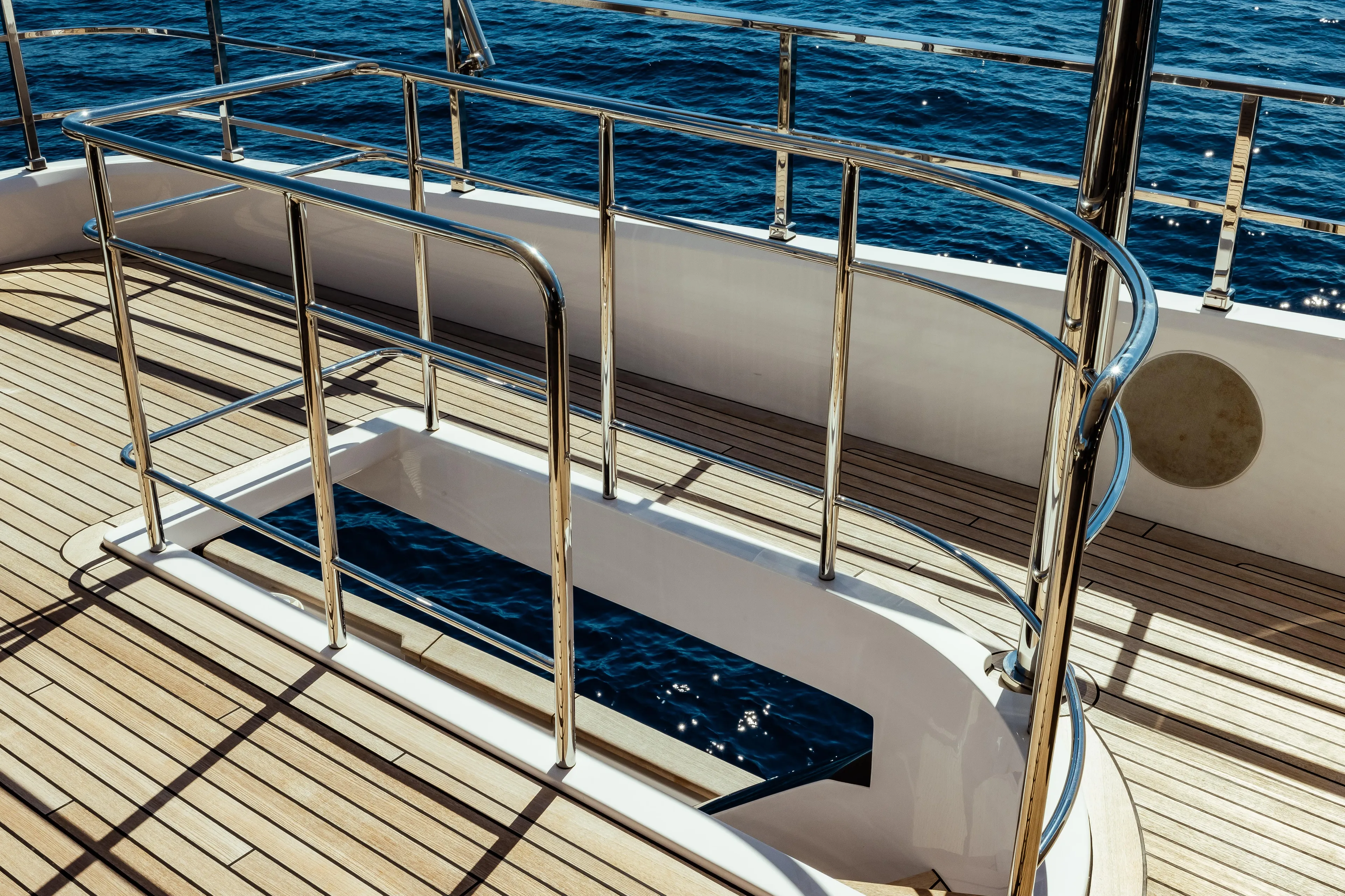  Yacht Photos Pics Deck view of 2022 Custom Line Navetta 30 yacht with stainless steel railings.