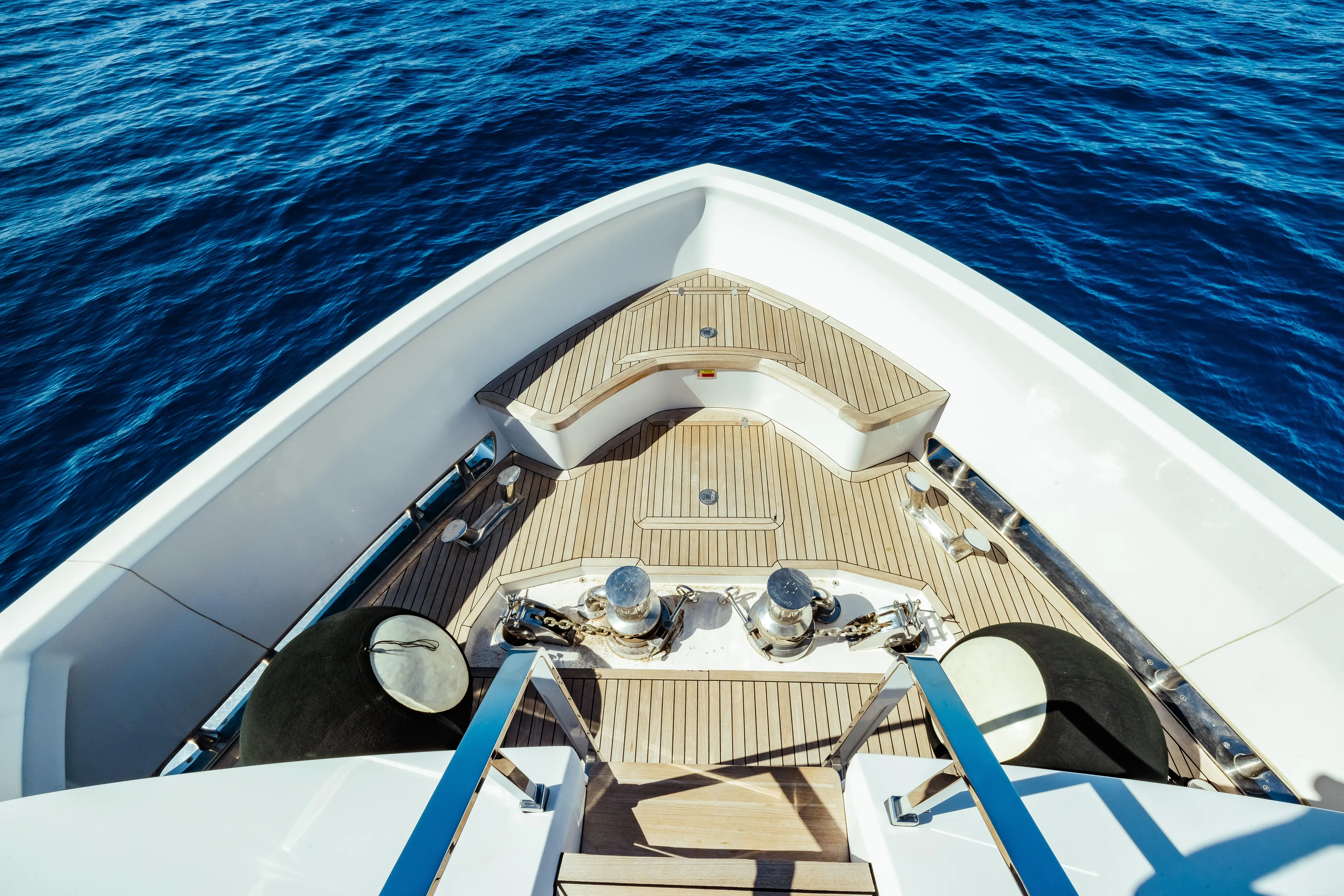  Yacht Photos Pics Bow view of 2022 Custom Line Navetta 30 yacht on open sea.