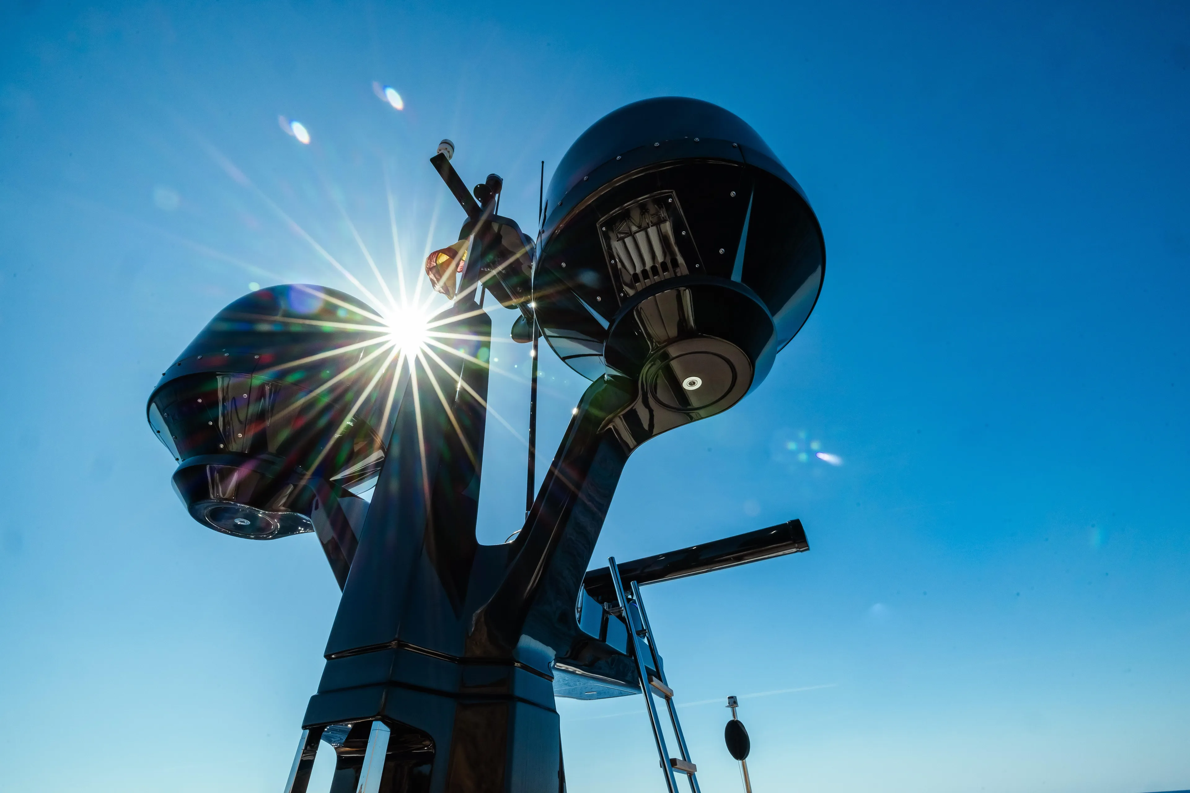  Yacht Photos Pics Radar equipment on 2022 Custom Line Navetta 30 yacht against clear blue sky.
