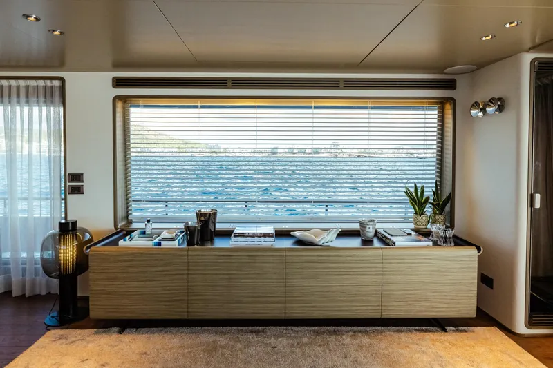  Yacht Photos Pics Luxurious interior of 2022 Custom Line Navetta 30 yacht with ocean view window.