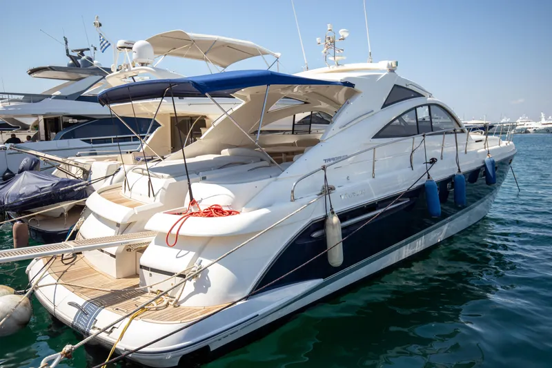  Yacht Photos Pics 2008 Fairline Targa 52 GT luxury yacht docked in a marina.