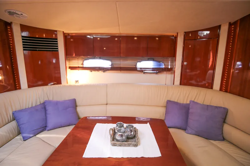  Yacht Photos Pics Luxurious interior of 2008 Fairline Targa 52 GT yacht with plush seating and elegant decor.