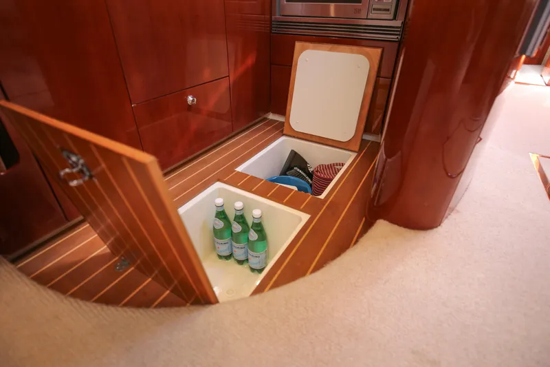  Yacht Photos Pics Luxury yacht Fairline Targa 52 GT 2008 interior with hidden storage compartment.