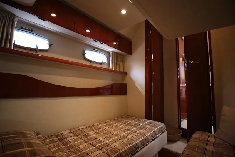  Yacht Photos Pics Luxurious cabin interior of 2008 Fairline Targa 52 GT yacht with twin beds.