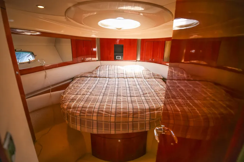  Yacht Photos Pics Luxurious cabin interior of 2008 Fairline Targa 52 GT yacht with cozy bed.