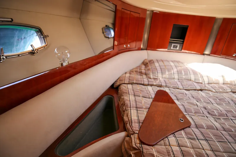  Yacht Photos Pics Luxurious cabin interior of 2008 Fairline Targa 52 GT yacht with elegant wood finish.