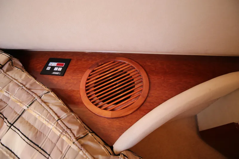  Yacht Photos Pics Interior of 2008 Fairline Targa 52 GT yacht with wooden vent and control panel.