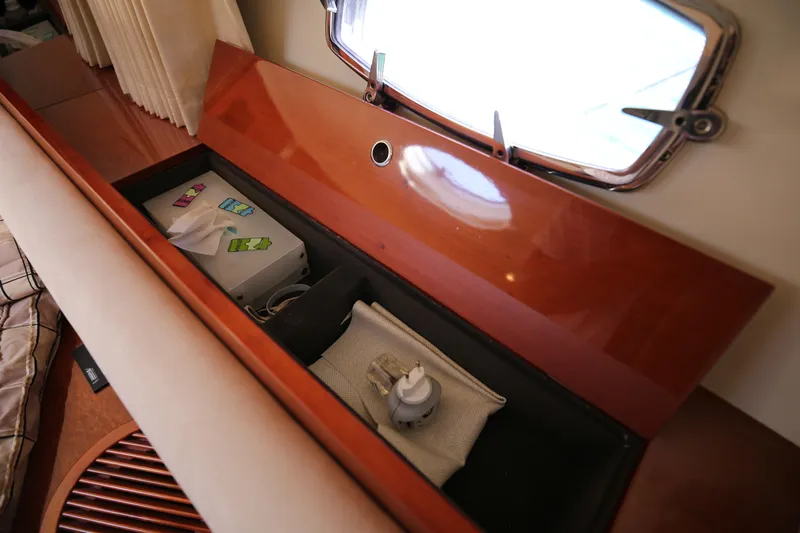 Yacht Photos Pics Interior storage compartment on 2008 Fairline Targa 52 GT yacht with window view.