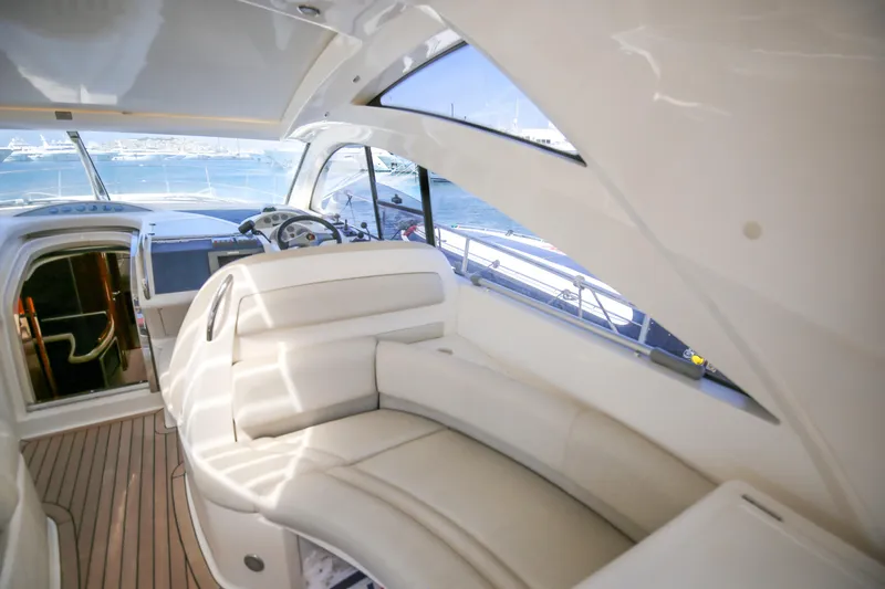 Yacht Photos Pics Interior of 2008 Fairline Targa 52 GT yacht with plush seating and helm view.
