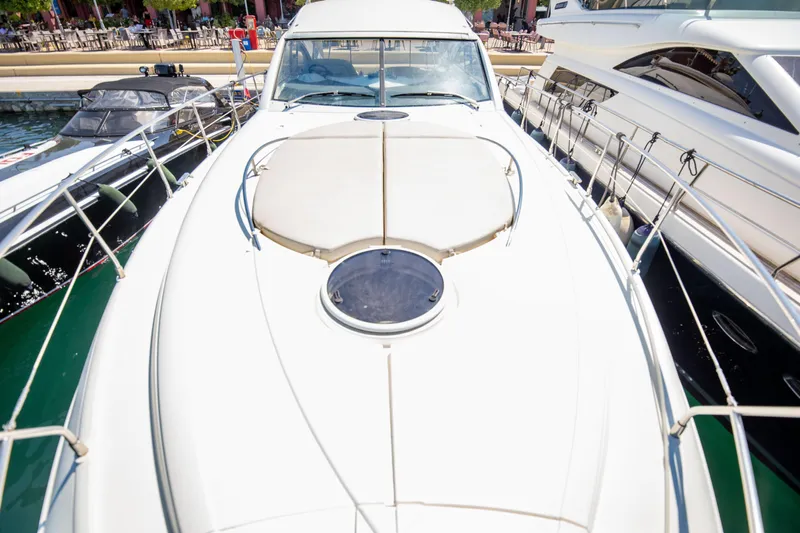  Yacht Photos Pics 2008 Fairline Targa 52 GT yacht docked at marina, top deck view.