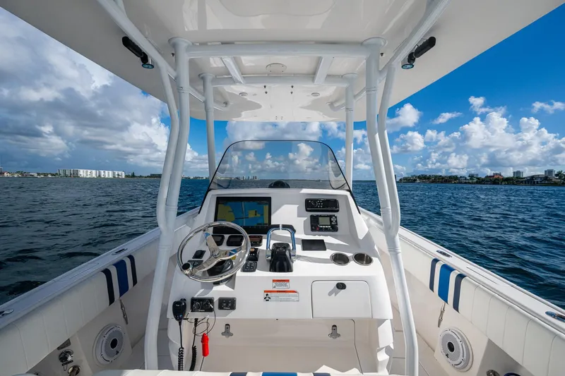 Match Point Yacht Photos Pics 2011 Intrepid 327 Center Console boat interior with ocean view and navigation equipment.