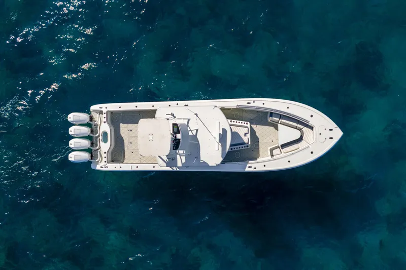  Yacht Photos Pics Overhead view of 2015 Yellowfin 42 Offshore boat on clear blue water.