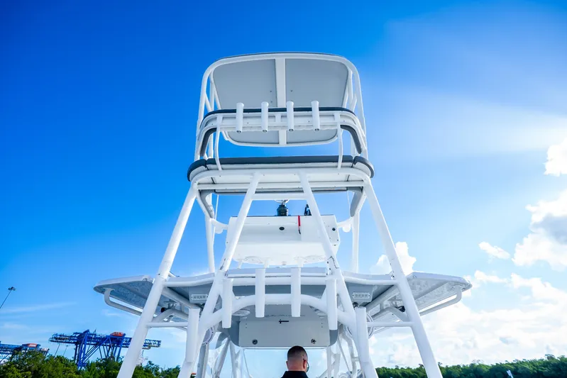  Yacht Photos Pics 2015 Yellowfin 42 Offshore boat tower against a clear blue sky.