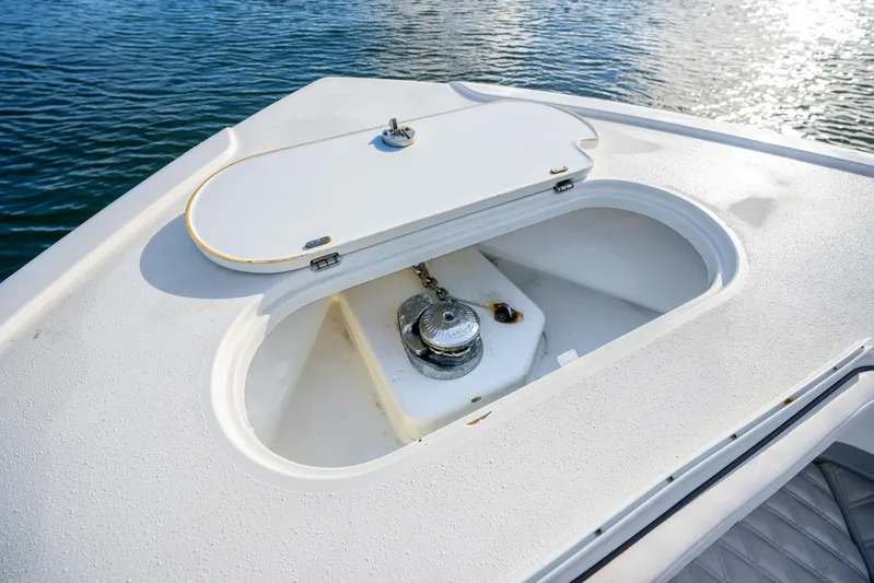  Yacht Photos Pics 2015 Yellowfin 42 Offshore boat anchor compartment on calm water.