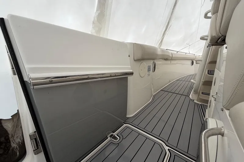  Yacht Photos Pics 2018 Boston Whaler 330 Outrage interior with sleek design and modern features.