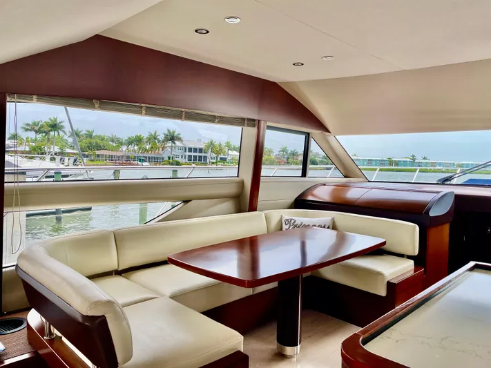  Yacht Photos Pics Luxurious interior of 2015 Princess F56 yacht with elegant seating and waterfront view.