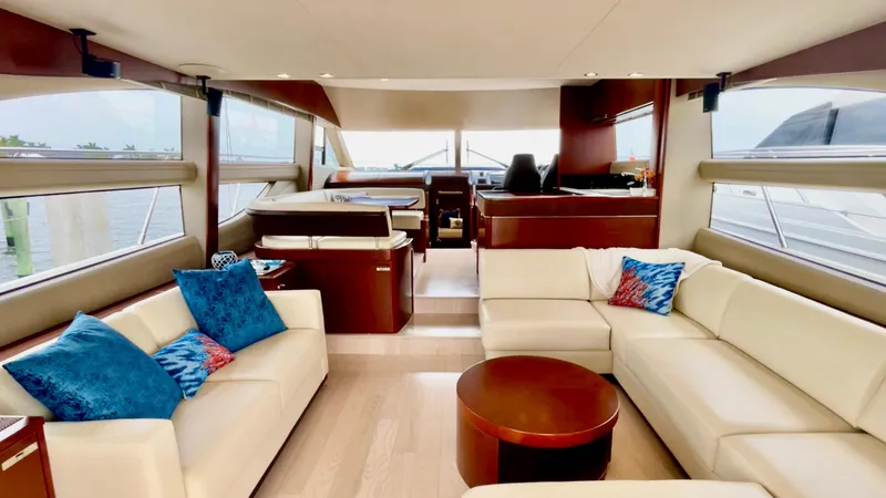  Yacht Photos Pics Luxurious 2015 Princess f56 yacht interior with white sofas and blue cushions.