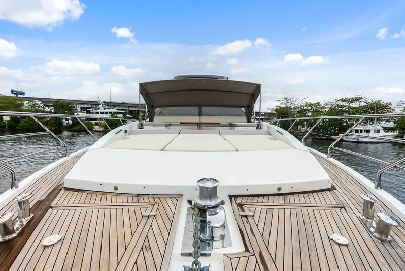 Class Dismissed Yacht Photos Pics 2017 Azimut 72 Flybridge yacht with spacious deck and luxurious seating area.