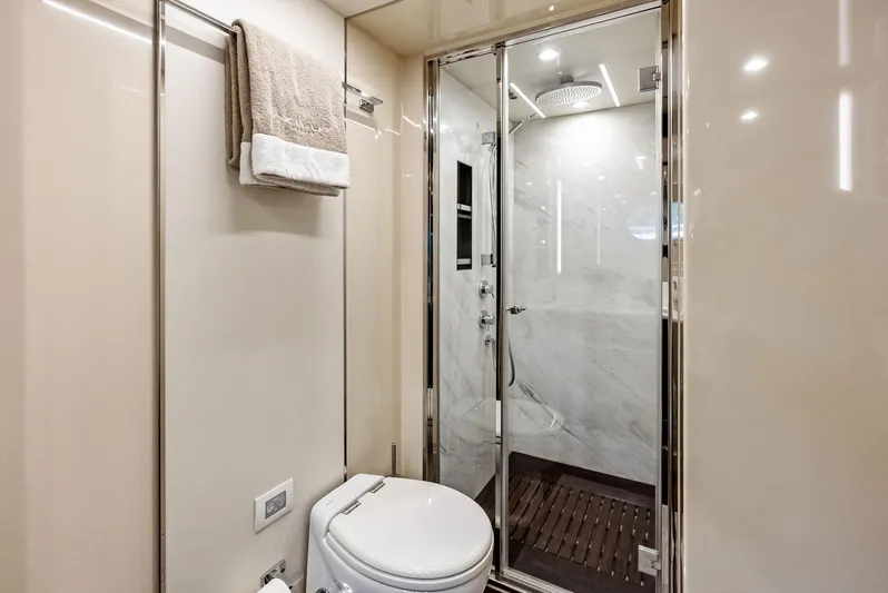 Class Dismissed Yacht Photos Pics Luxurious bathroom in 2017 Azimut 72 Flybridge yacht with modern shower and toilet.