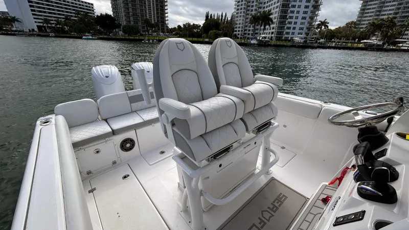  Yacht Photos Pics 2024 Sea Fox 268 Commander boat interior with dual seats and water view.