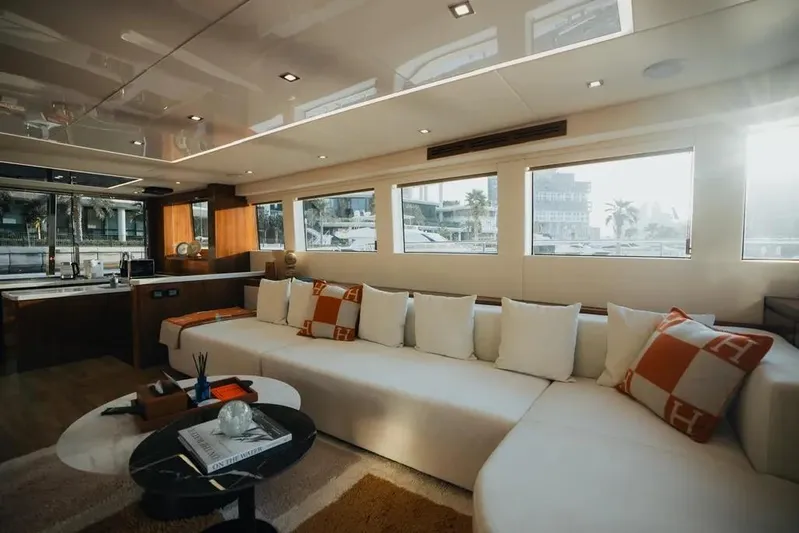 Mazarin Evo II - E-motion Italy - Parallel Hybrid Yacht Photos Pics Luxurious interior of 2025 Mazarin 55 EVO II yacht with modern design and plush seating.