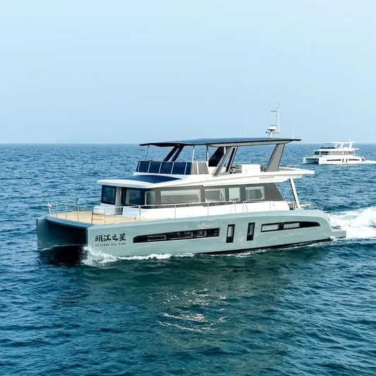 Mazarin Evo II - E-motion Italy - Parallel Hybrid Yacht Photos Pics Mazarin 55 EVO II hybrid yacht cruising on open sea, 2026 model.