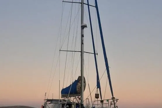 Gabsi Yacht Photos Pics Sailing yacht "Southwell 51" at sunset, 2022 model, with blue sails.