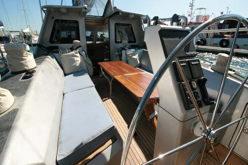 Gabsi Yacht Photos Pics Luxurious 2022 Custom Southwell 51 yacht interior with spacious seating and modern navigation equipment.