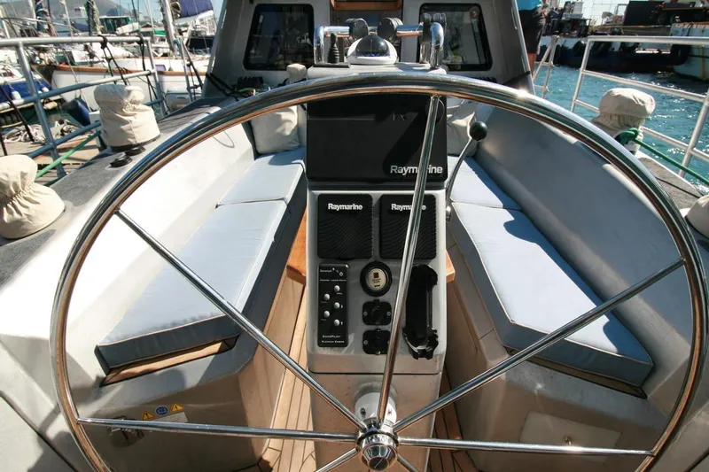 Gabsi Yacht Photos Pics Cockpit of 2022 Custom Southwell 51 yacht with steering wheel and navigation equipment.