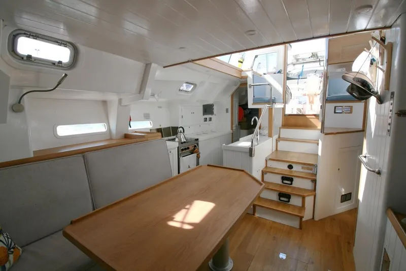Gabsi Yacht Photos Pics Interior of 2022 Custom Southwell 51 yacht, featuring modern kitchen and dining area.