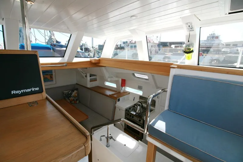 Gabsi Yacht Photos Pics Interior of 2022 Custom Southwell 51 yacht with modern seating and navigation equipment.
