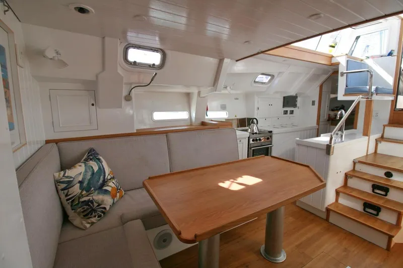 Gabsi Yacht Photos Pics Interior of 2022 Custom Southwell 51 yacht with modern kitchen and cozy seating area.
