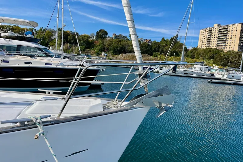 Sosy Yacht Photos Pics Beneteau Oceanis Clipper 423 sailboat docked in a marina, 2006 model.