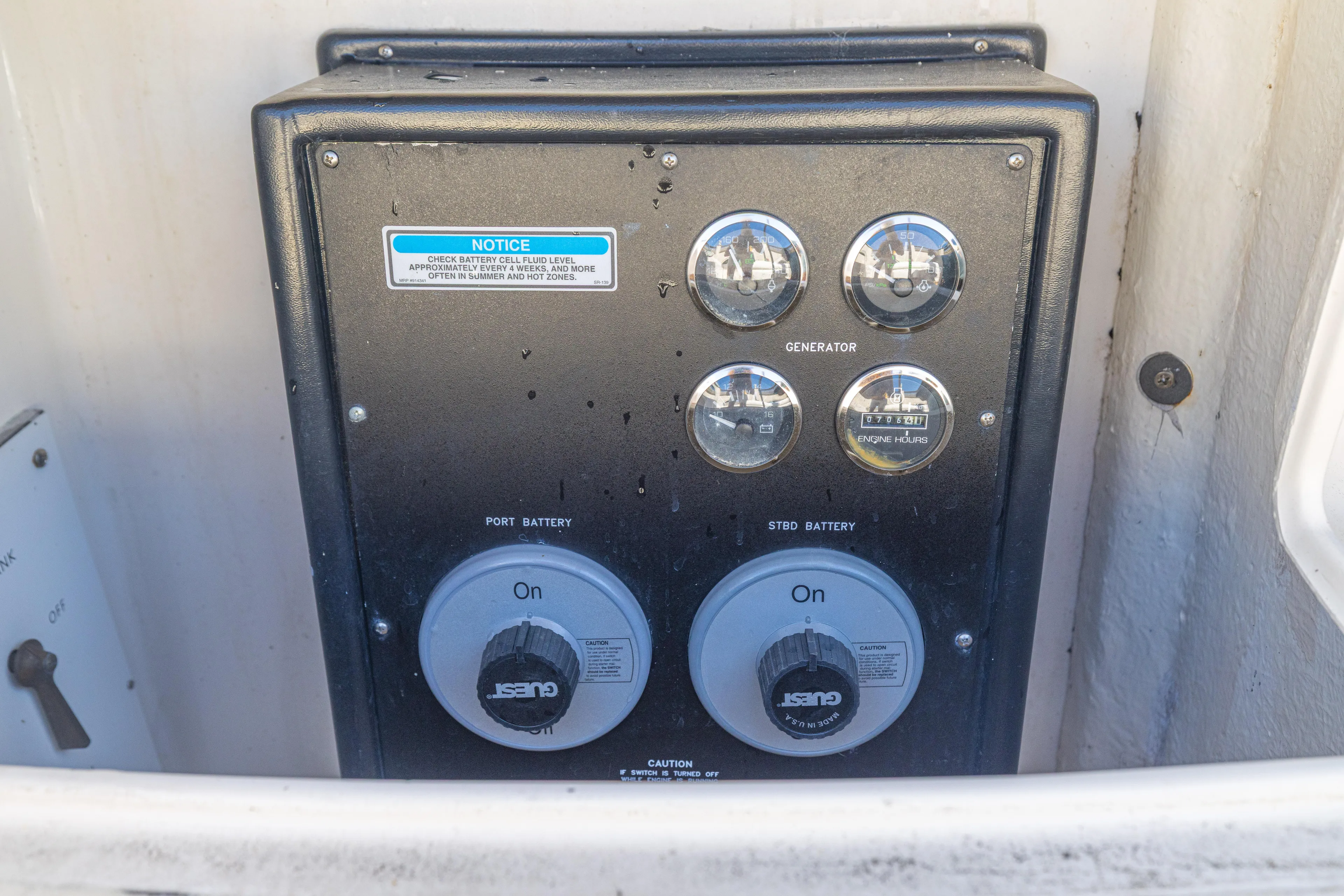  Yacht Photos Pics Control panel of a 1999 Sea Ray 450 Express Bridge boat, showing battery and generator gauges.