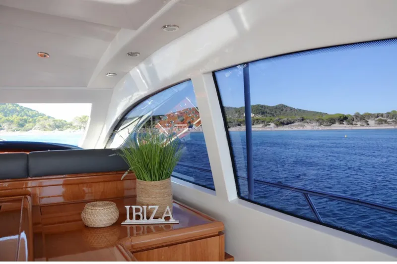  Yacht Photos Pics Interior of 2003 Mangusta 72 yacht with sea view and Ibiza decor.