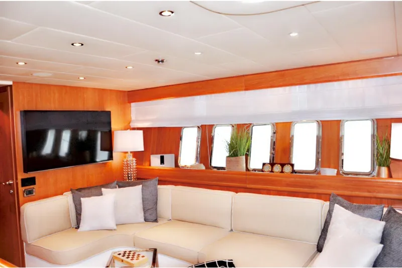  Yacht Photos Pics Luxurious interior of 2003 Mangusta 72 yacht with elegant seating and decor.
