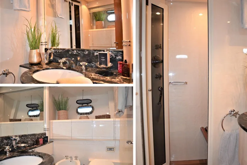  Yacht Photos Pics Luxurious bathroom interior of 2003 Mangusta 72 yacht with elegant fixtures and modern design.
