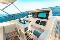 Helm of 2007 Custom Line 112 yacht with navigation equipment and ocean view.